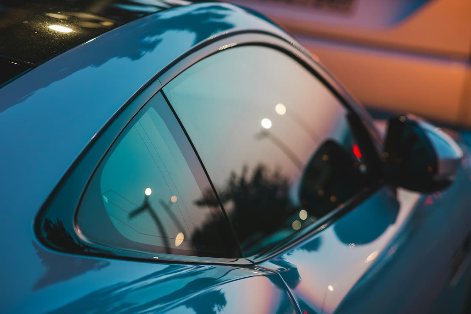 Tinted glass on a car door and rear quarter window